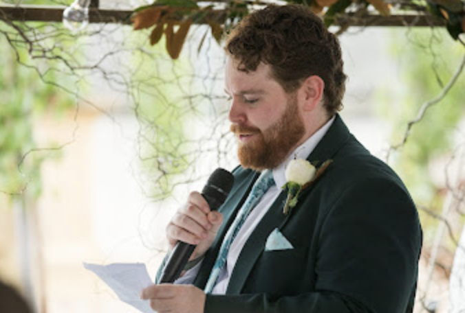 Andrew performing a wedding ceremony